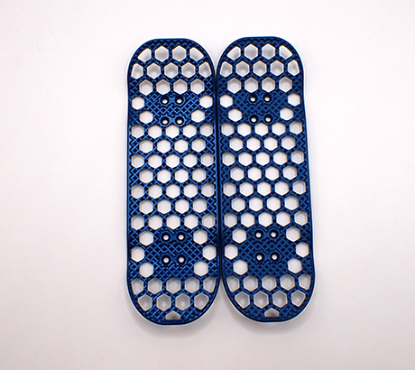 Metal fingerboard with machined grip in blue.